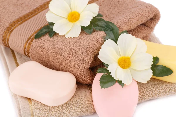 Folded Towels Soaps Flowers Closeup Picture — Stock Photo, Image