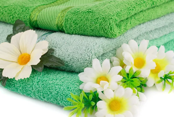Handdukar och blommor — Stockfoto