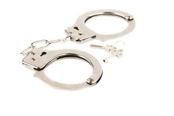 Handcuffs and keys — Stock Photo, Image