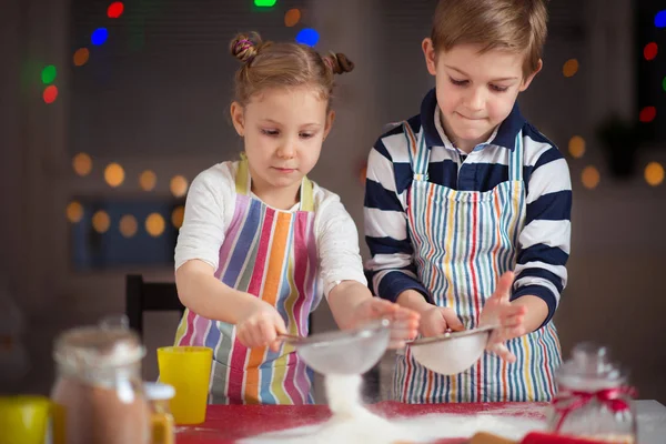 Happy  little children preparing Christmas cookies — Stock Photo, Image