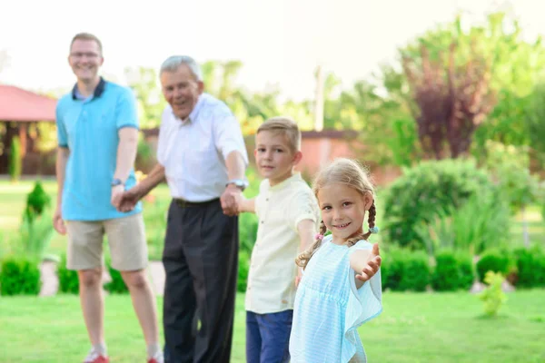 Portrait of happy old grandfather and cute children — Stock Photo, Image