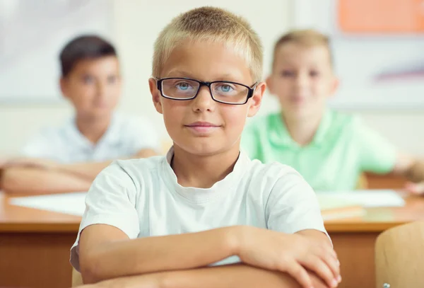 Happy clever children learning in classroom — Stock Photo, Image
