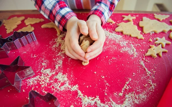 Close up of childs hands making christmas cookies Stock Image