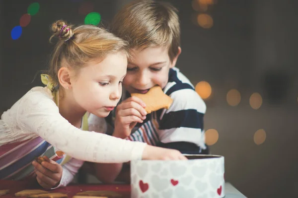 Happy  little children preparing Christmas cookies — Stock Photo, Image