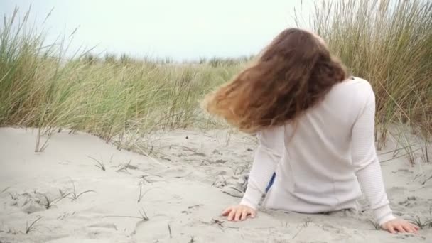 Young Caucasian Woman Pulling Her Curly Hair Baltic Coastline Dunes — Stock Video