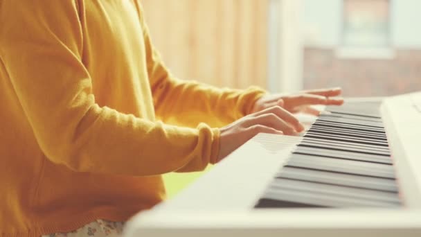 Pretty Little Girl Playing Piano Home — Stock Video