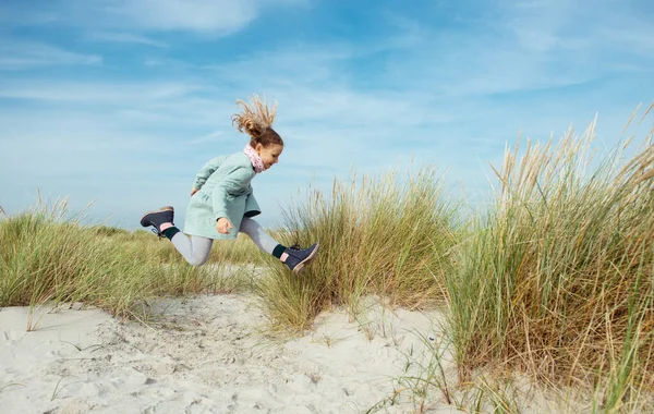 Happy Little Girl Blue Dress Jumping Beach Baltic Sea Sunny — Stock Photo, Image