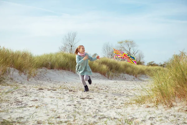 Cheerful Little Girl Running Dress Beach Kite Sunny Day — Stock Photo, Image