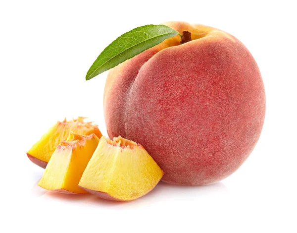 Персик с ломтиком — стоковое фото