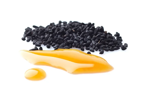 Schwarzkümmelöl Mit Samen Auf Weißem Hintergrund — Stockfoto