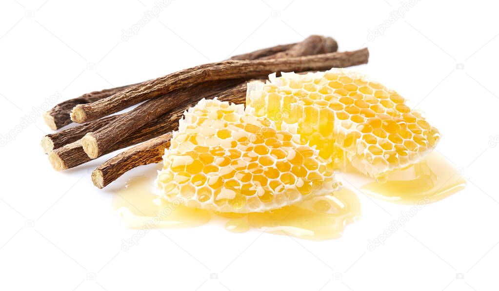 Liquorice root with honeycombs on white