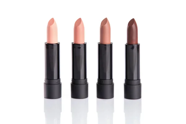 Set of four lipsticks in glamorous colors — Stock Photo, Image