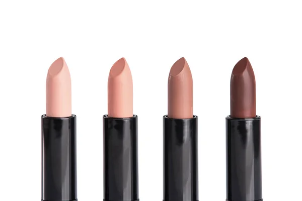 Four lipsticks in trendy colors — Stock Photo, Image