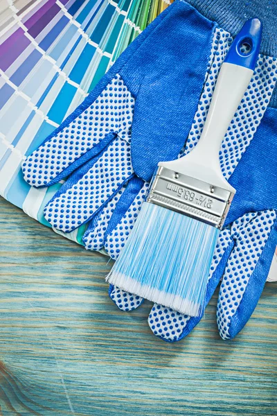 Safety gloves with color sampler and brush — Stock Photo, Image