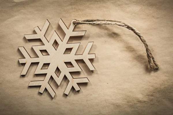 Vintage wooden winter snowflake decoration — Stock Photo, Image