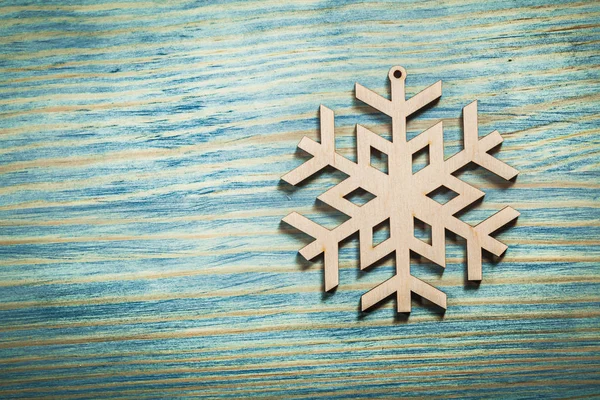 Vintage wooden winter snowflake decoration — Stock Photo, Image