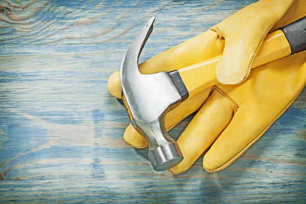 Claw hammer with leather safety gloves — Stock Photo, Image