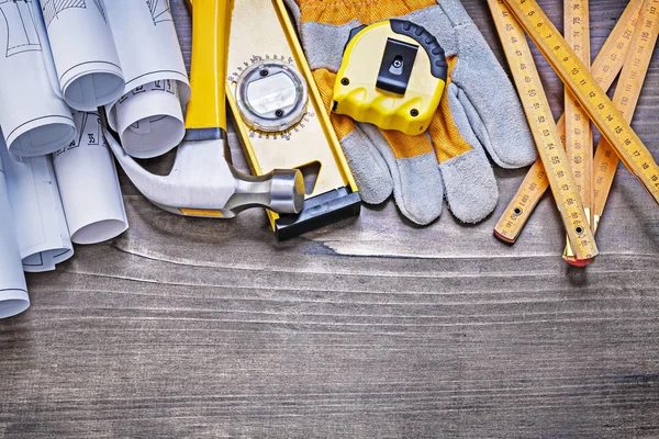 Pine wooden vintage board with construction plans and set of bui — Stock Photo, Image