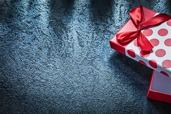 Opened gift box with red ribbon on black background copy space h — Stock Photo, Image