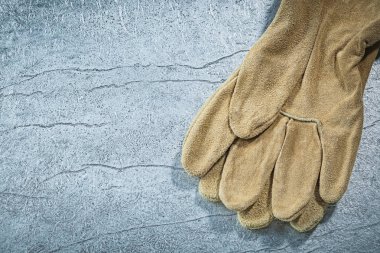 Deri Emanet eldiven Metalik arka plan inşaat concep