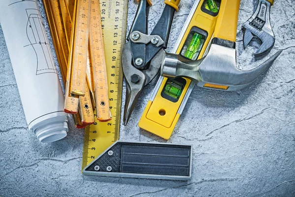 Composición de las herramientas de construcción sobre fondo metálico abstracto —  Fotos de Stock