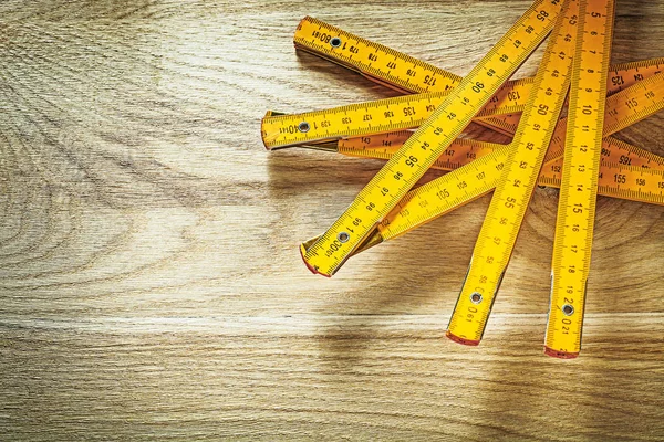 Wooden meter on wood board horizontal image construction concept — Stock Photo, Image