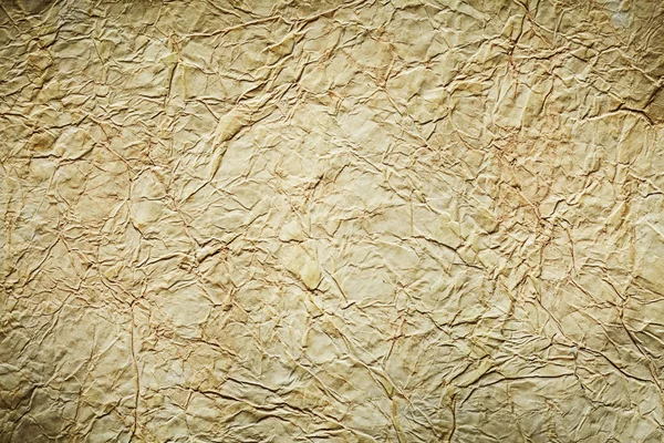 Vintage crumpled papel no fundo cinza close up view — Fotografia de Stock