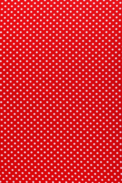 Red polka-dot cotton fabric vertical view