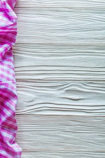 Pink cotton tablecloth on wooden board — Stock Photo, Image