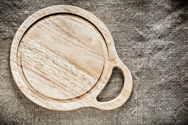 Arka plan çuval bezi üzerinde tahta oyma