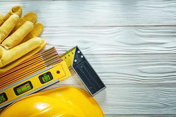 Guantes de seguridad tratar de construcción cuadrada nivel de madera metro duro ha — Foto de Stock