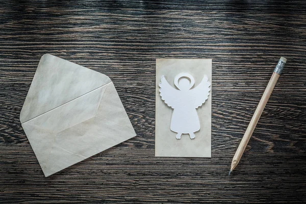 Vintage zarf kağıt melek kalem kara tahta üzerinde