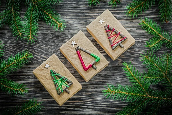 Blank gift tags with pine branch and Christmas cookies on textile  background. The concept of preparing for the Christmas holiday, Stock  image