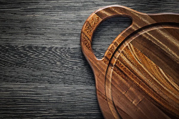 Tagliere in legno su fondo legno — Foto Stock