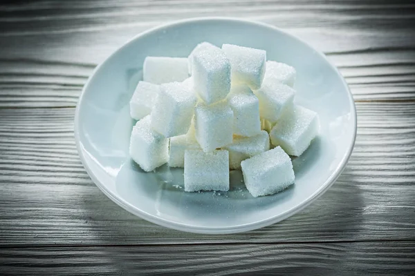 Kahve fincan tabağı vintage ahşap tahta üzerinde kesme şeker