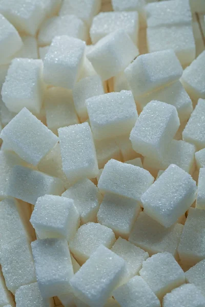 Zucchero bianco cubetti concetto di cibo vista verticale — Foto Stock