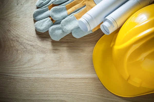 Safety gloves hard hat construction plans — Stock Photo, Image