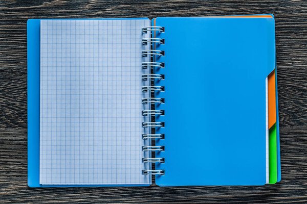 Checked notepad on vintage wooden board