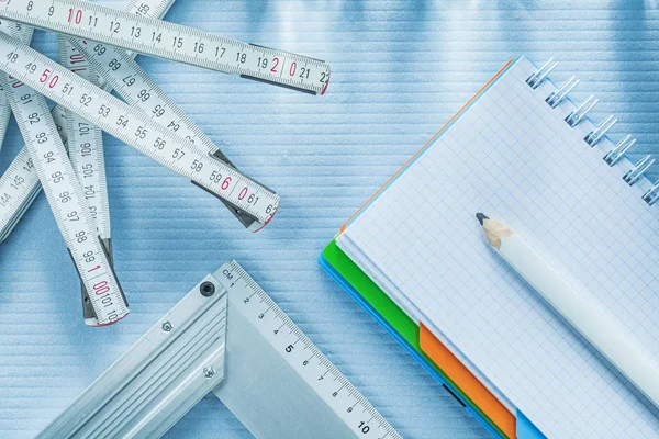 Tente quadrado verificado notepad fita métrica lápis — Fotografia de Stock