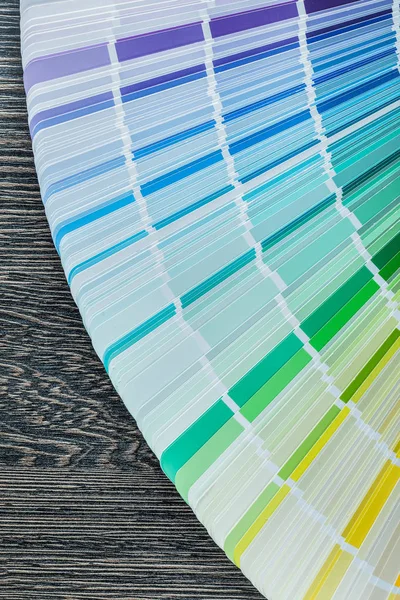 Color pantone fan on wooden board