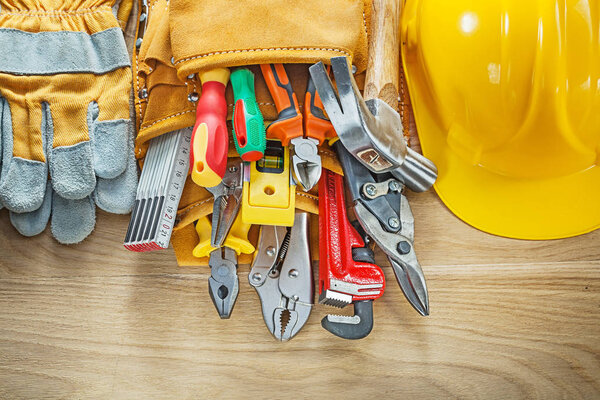 Construction tooling tool belt safety gloves hard hat