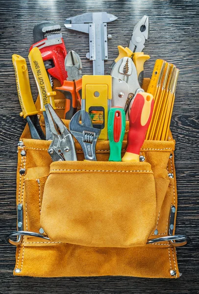 Set of leather tool belt building tooling vertical view — Stock Photo, Image