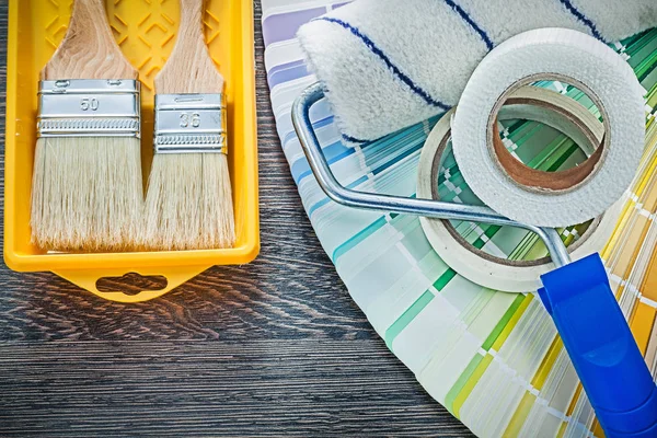 Paint brushes roller tray color sampler household tape — Stock Photo, Image