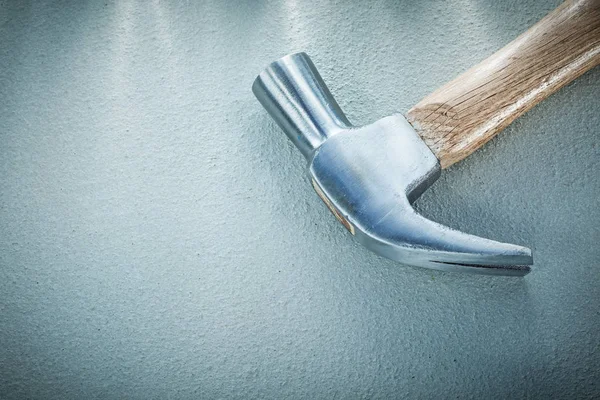 Claw hammer on concrete background — Stock Photo, Image