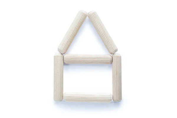 New wooden dowels isolated on white top view — Stock Image New wooden dowels isolated on white top view Royalty Free Stock Photos