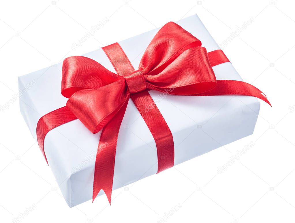 White wrapped present box with red ribbon isolated on white