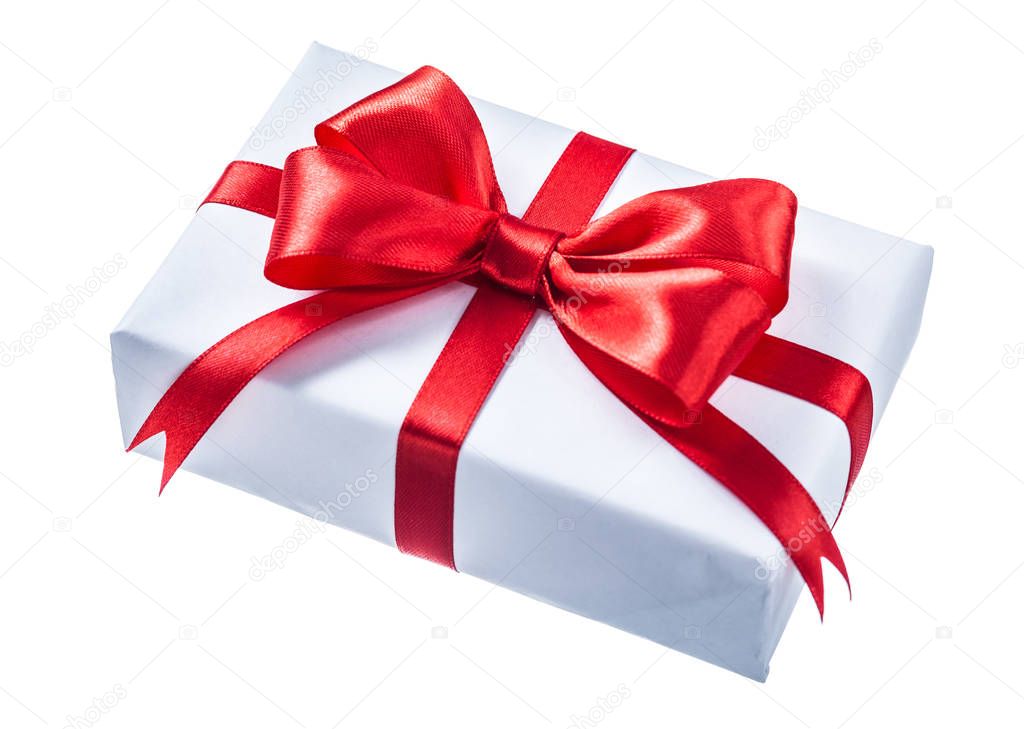 White gift box with red ribbon isolated on white