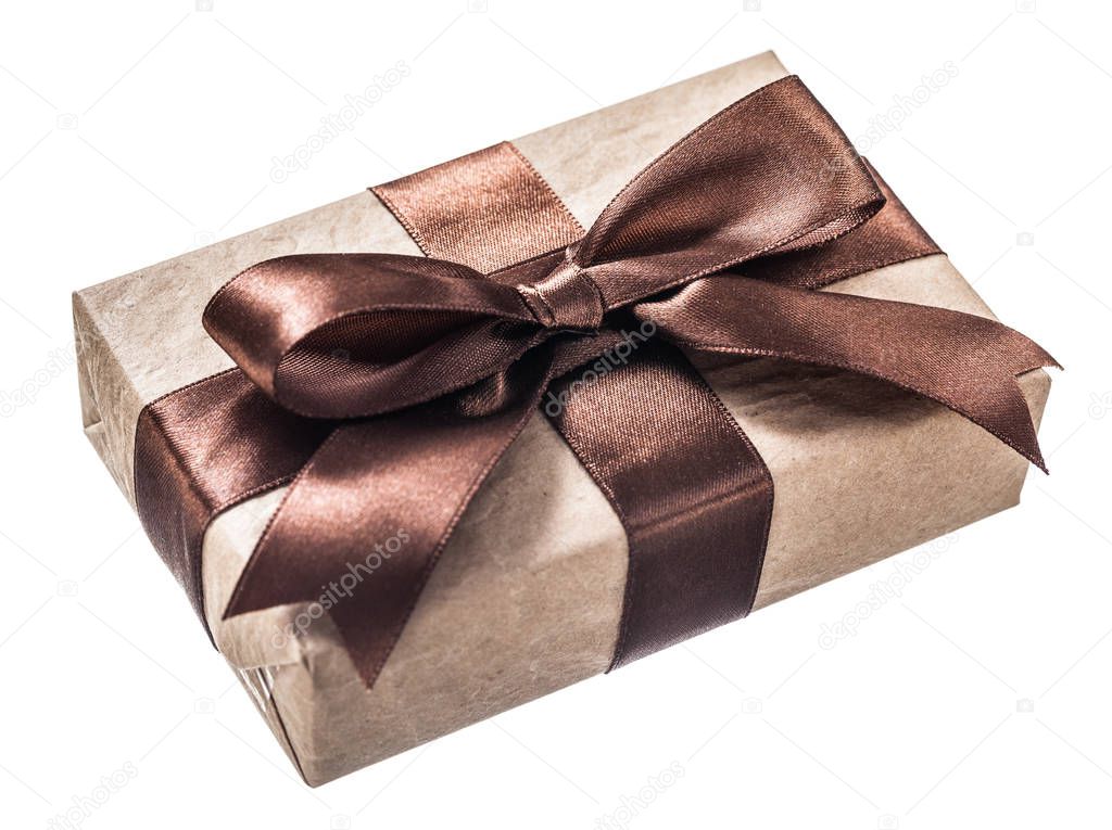 Vintage gift box with brown ribbon isolated on white