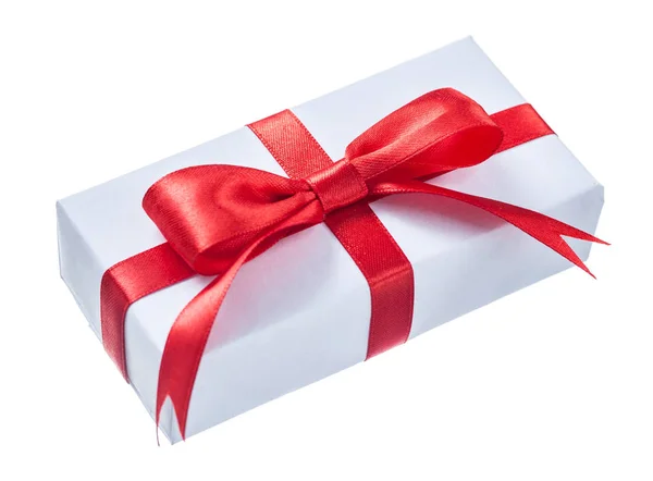 White wrapped gift box with red bow isolated on white Stock Picture