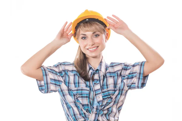 Uma jovem trabalhadora segurando capacete — Fotografia de Stock